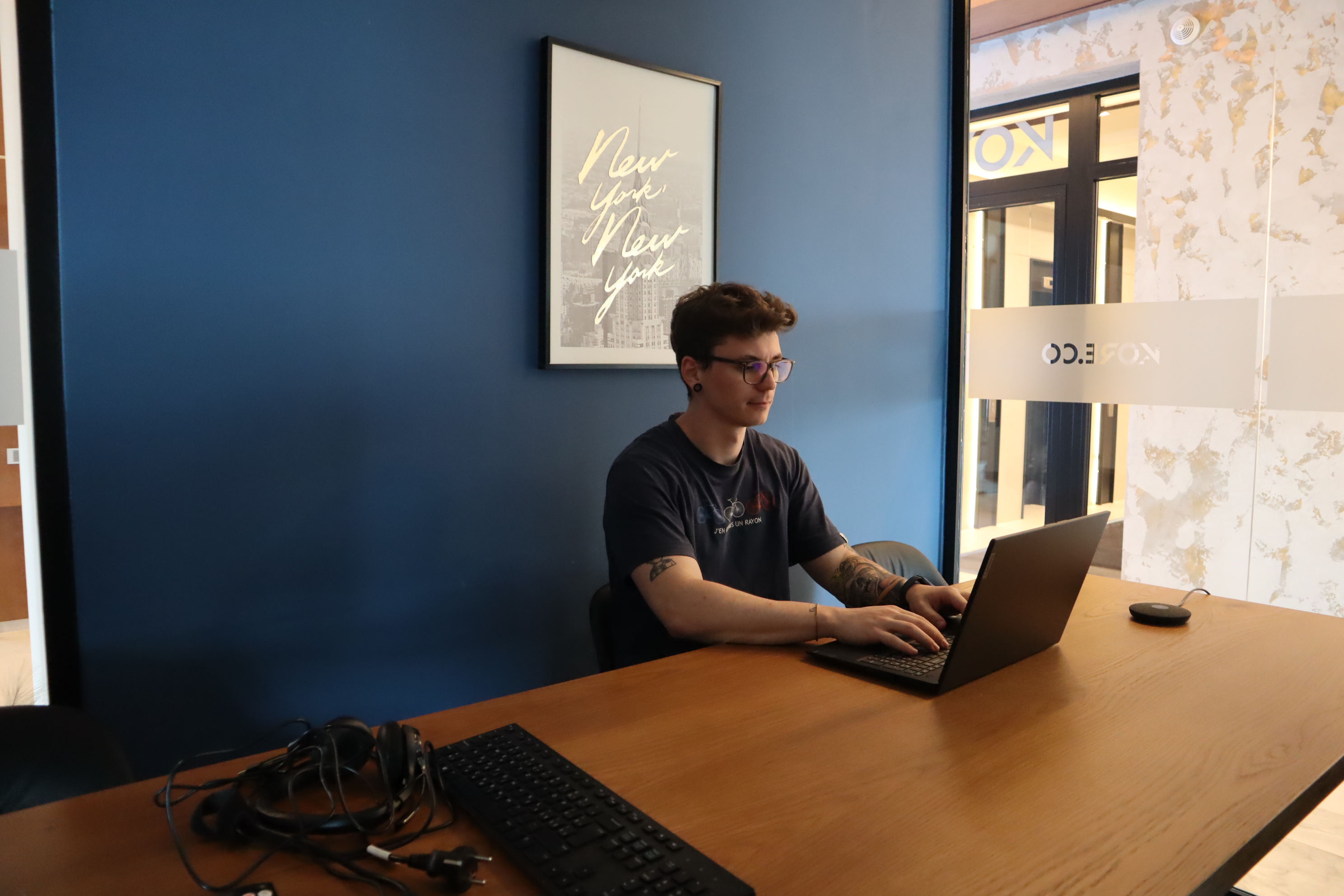 Kore team member working at a desk