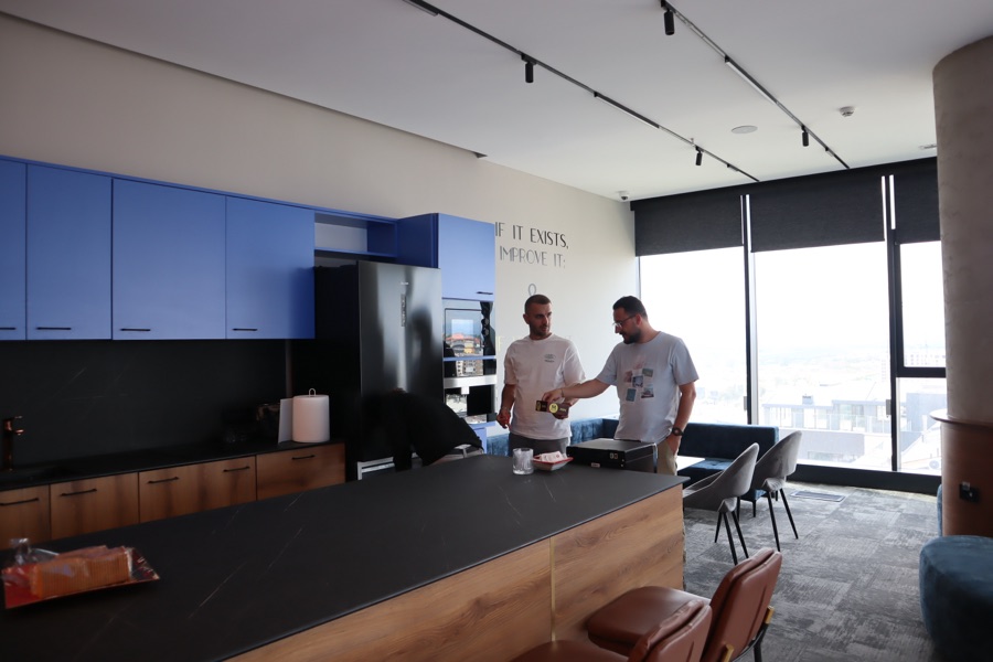 Kore team members in the office kitchen